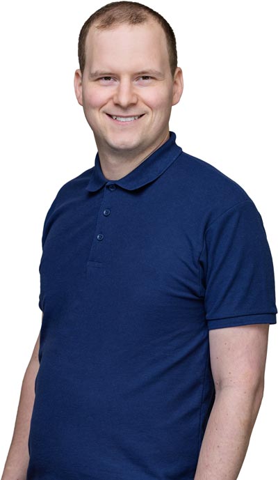 Portrait eines Mitarbeiters der Betriebsleitung der Deusch & Co. GmbH vor hellem Hintergrund